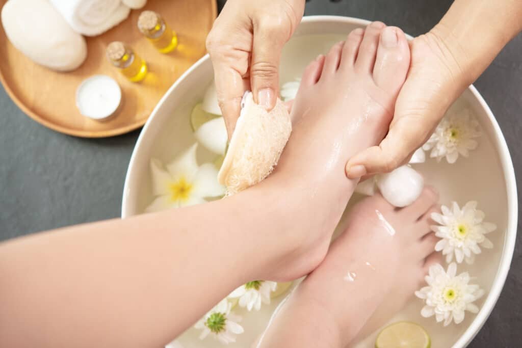 Why Your Feet Deserve a Professional Pedicure 4 foot washing spa before treatment spa treatment product female feet hand spa